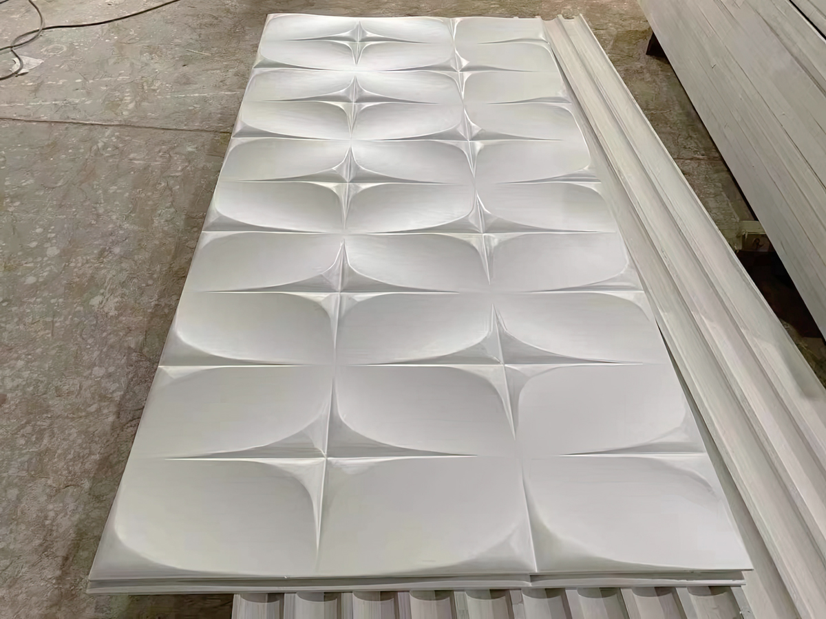 CNC-milled wall art painted white. Source: FacFox