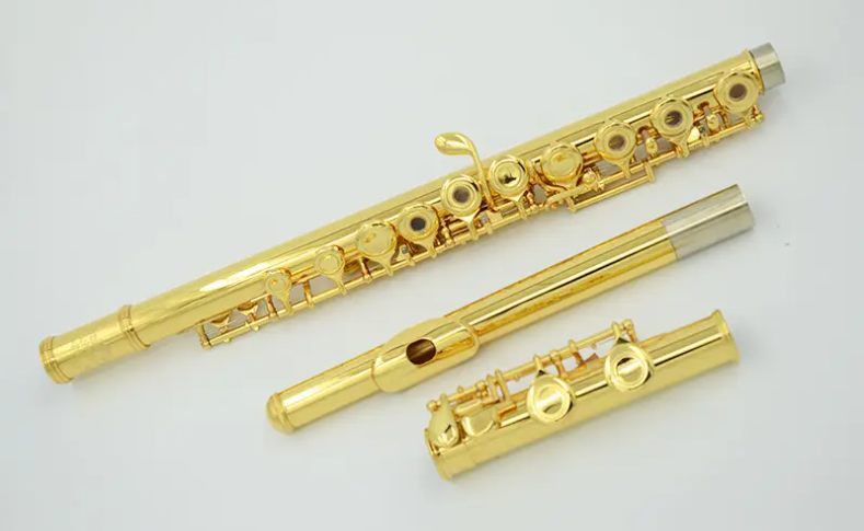 CNC machining brass flute bodies with correct tone holes and embouchure in the right position. 