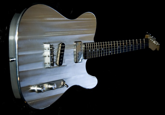 Liquid Metal Guitars used a Haas VMC to produce futuristic aluminum guitars. Photo source: LMG